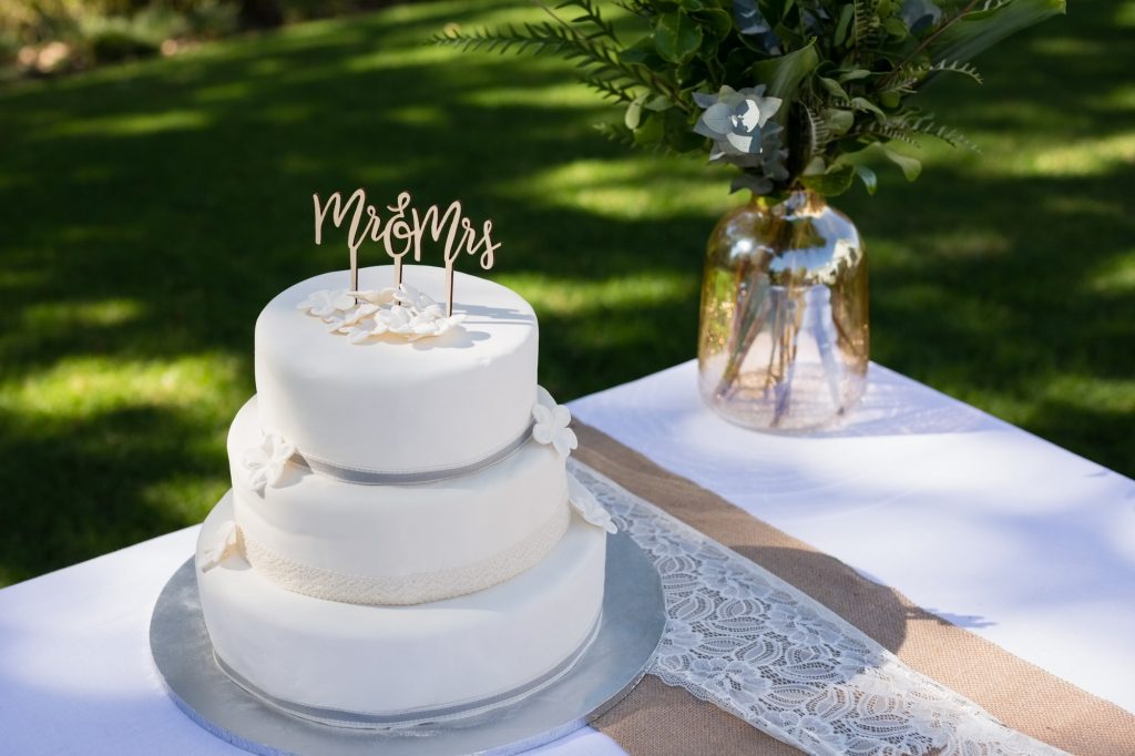Decorated wedding cake on table